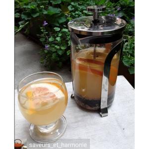 Cocktail thé fumé et agrumes